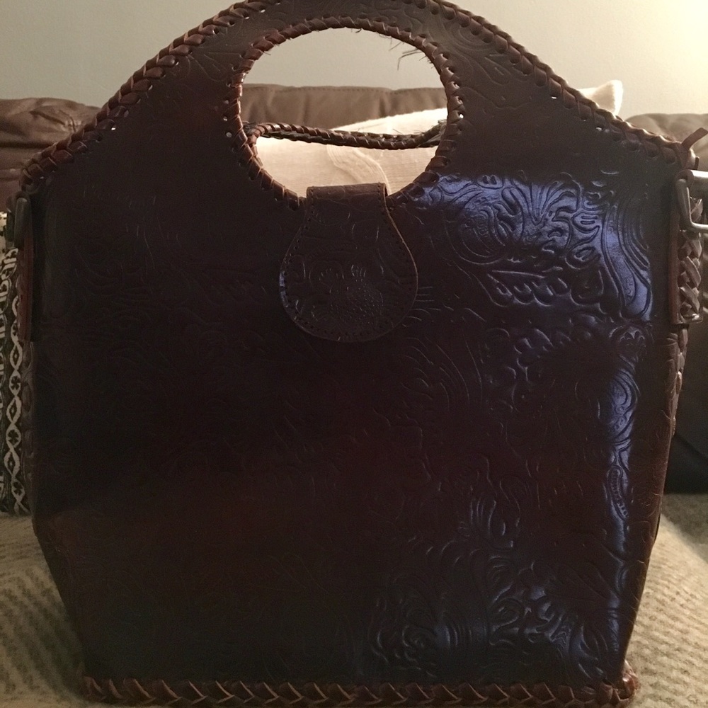 Rich vintage patterned leather reddish brown purse